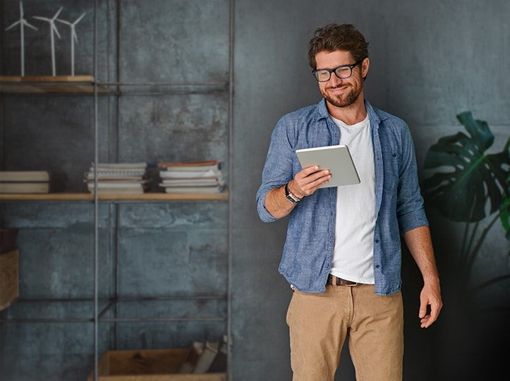 Man standing with tablet