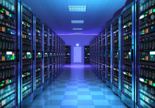 Bank of computer servers with purple lighting 