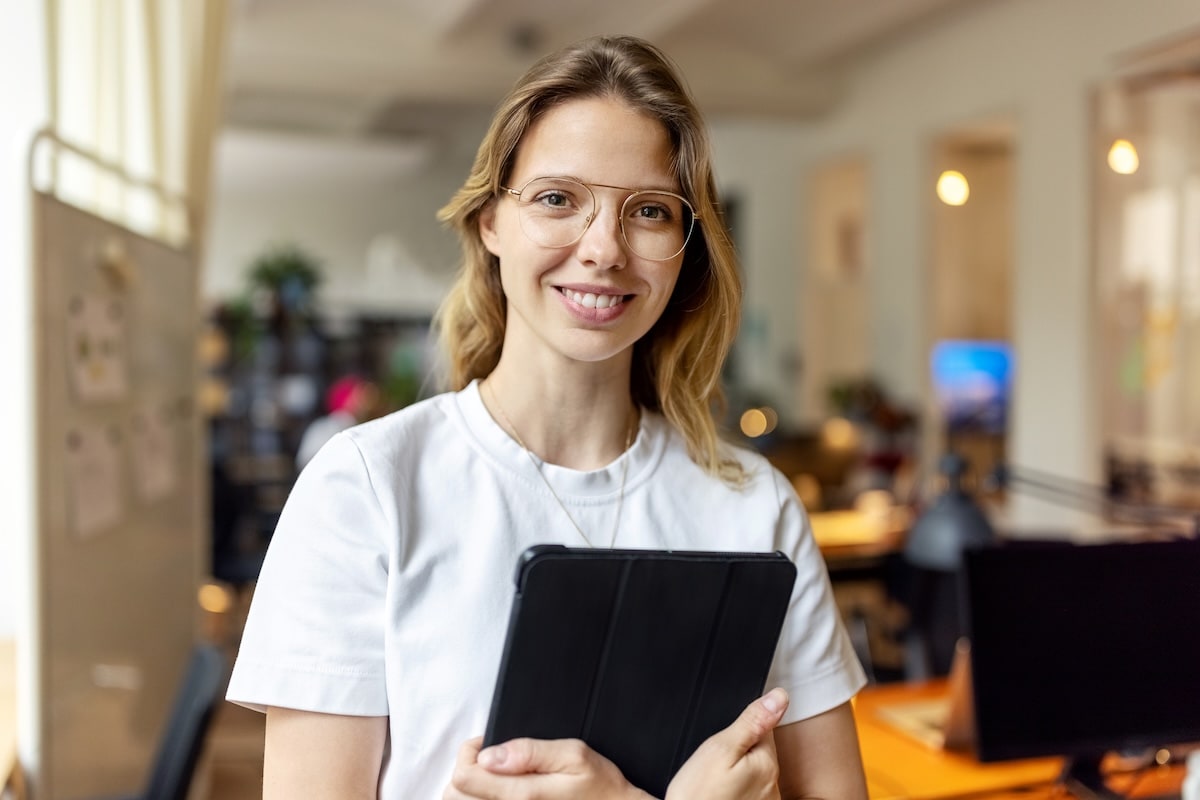 woman holding tablet