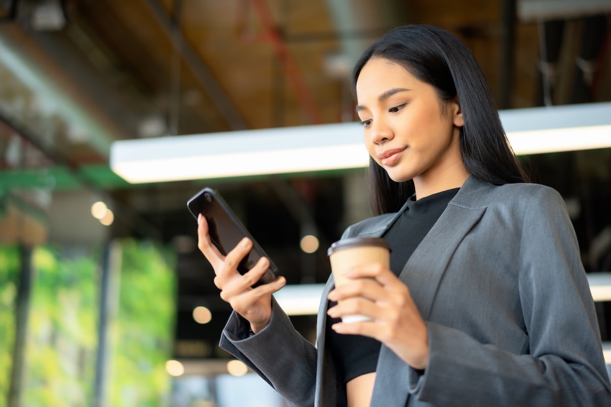 woman looking at phone