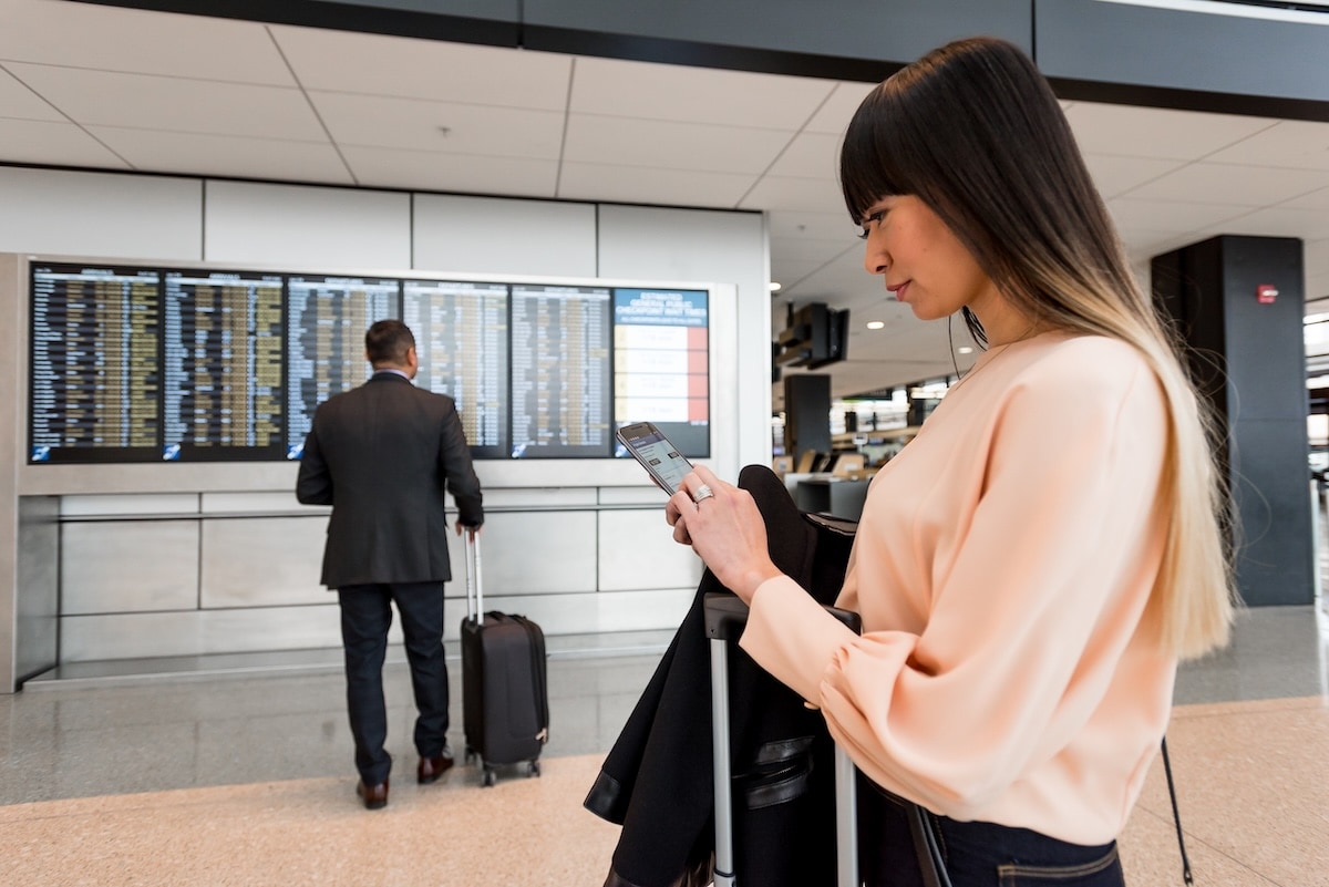 woman on phone at airport